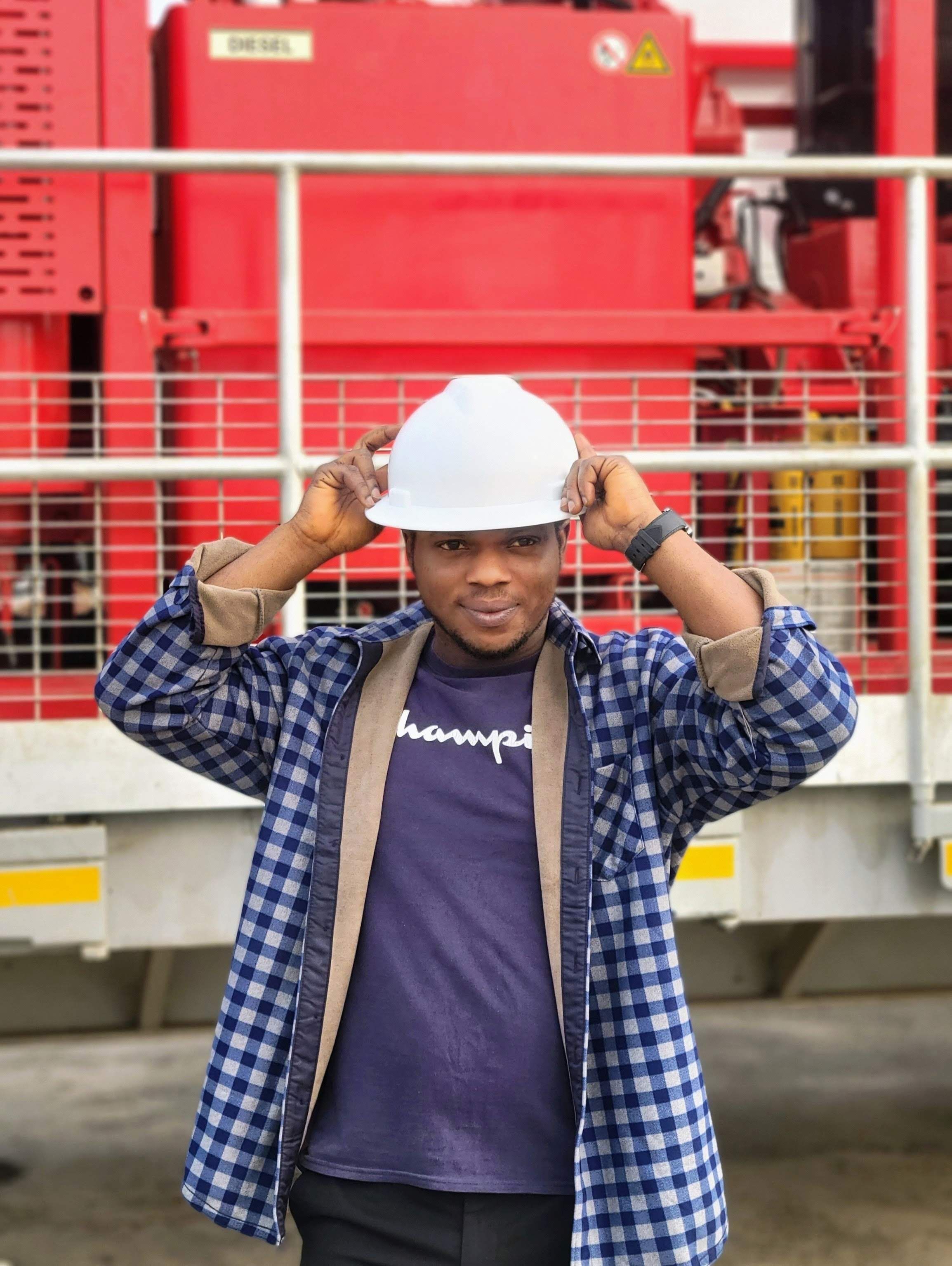 Site worker preparing protective equipment